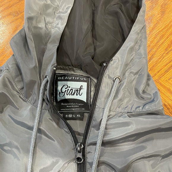 Grey and black “beautiful giant” raincoat - Picture 4 of 6